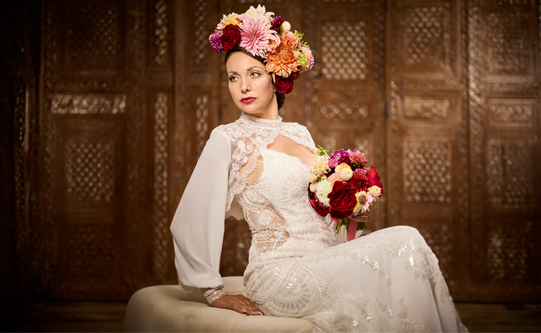 Woman in front of a Moroccan Screen