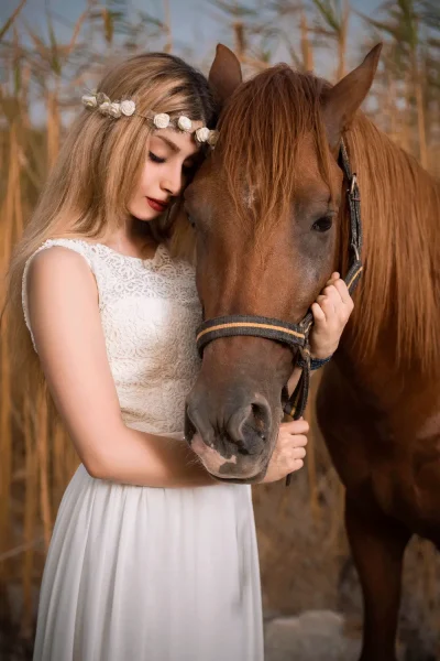 fashion model white dress posing with horse