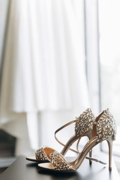 sparkling shoes with crystals wedding dress hanging